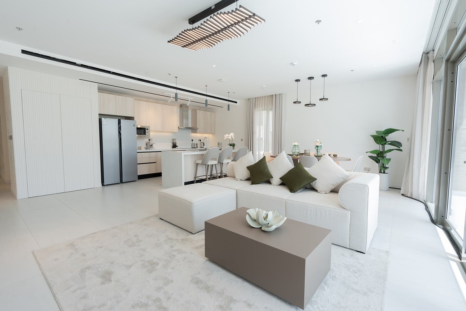 Spacious and cozy family living room with contemporary furniture at Marissa Elite.